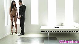 busty babe gets pussyfucked while bound in bondage, kissing her friend passionately