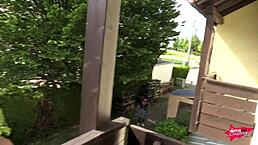 German couple shares intimate outdoor moments on the public balcony with fingering and masturbation