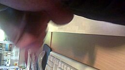 guy jerks his cock in a crowded internet cafe spot