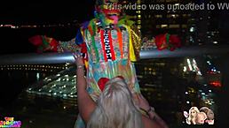 Man, that big booty white girl is sucking off a BBC clown on a high rise patio at NYE!