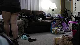 Chubby girl cleans the house