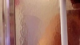 Shy milf shaves in shower