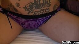 Amazing blonde with glasses and tattoo performs oral in bedroom.