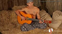 Gay Asian Muscle Guitarist Plays On The Hay.