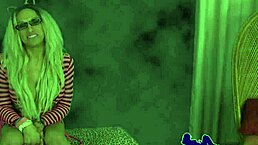 Why is this inked shemale with big tits wanking on her back?