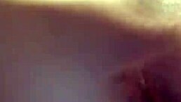 A woman enjoys a relaxing outdoor self-pleasure session in public