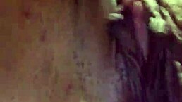 A woman enjoys a relaxing outdoor self-pleasure session in public