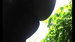 Ebony woman exposes naked body publicly