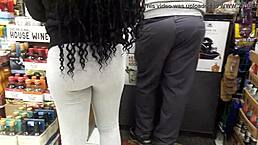 ebony shorty getting booze in baltimore l store