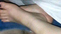 Intense lubed footjob session before bedtime.