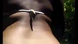 Ebony woman exposes naked body publicly