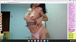 petite rocker babe in cosplay shows tattooed body naked on cam