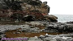 The Asian masseuse receives oral pleasure during her session.