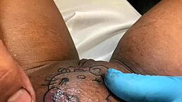 Ebony woman receives tattoo appointment