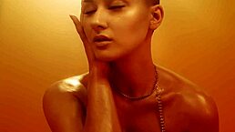 Blonde Short-Haired Babe with Big Tits Teases in Oiled-Up Hypno PMV