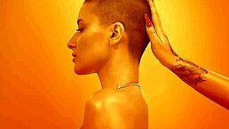 Blonde Short-Haired Babe with Big Tits Teases in Oiled-Up Hypno PMV