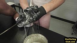 fisted hunk drilled by long-haired stud on office desk during break