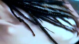Skinny girl with dreadlocks films homemade video