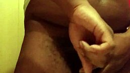 he slowly strokes his big black monster cock