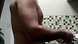 I watch the macho guy bent over washing dishes in doggystyle position.