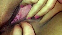 Latina rubs her clit.