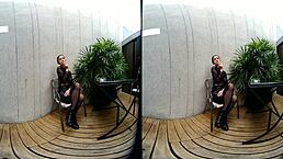 in this vr, a young girl smokes topless in her leather skirt