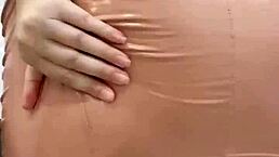 Curvy milf in latex beige dress gives jerk off instructions