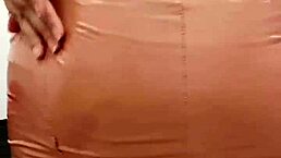 Curvy milf in latex beige dress gives jerk off instructions