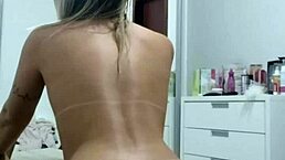 Let's play with the plug in your ass, Bruna, I say.