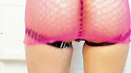 she's wearing sexy fishnet lingerie on her big ass