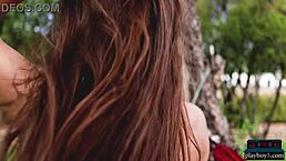 Curvy milf brunette Gloria Sol strips with her natural big tits on display.