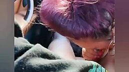 Sexy BBW milf sucks interracial cock in car, nearly caught in parking lot.