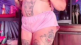 Curvy milf teases seductively in silky pajamas