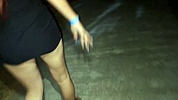 Married fanny exposes her small waist and ass in public outdoor street.