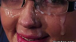 nasty doll takes a huge cumshot on her face and eats all the jism