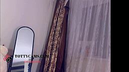 Dark-haired teen stunner shows off her big tits solo on webcam