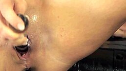 Masturbating domina plays with her wet pussy!