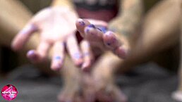 This babe gives a sensual footjob to a rubber cock, indulging in her foot fetish.