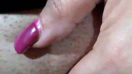 feeling intense pleasure with a black dildo while bound