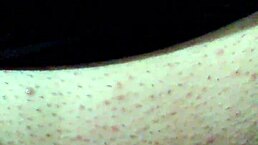 feeling intense pleasure with a black dildo while bound