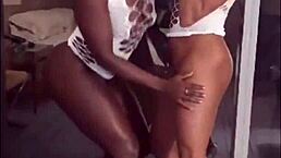 Two hot black girls celebrate new year dancing and flashing their pussies.