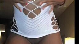 Two hot black girls celebrate new year dancing and flashing their pussies.