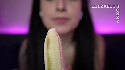 Brunette engages in dirty talk and banana play