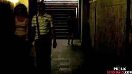 Busty slut in lingerie and heels submits publicly to voyeurs with big tits and nipples exposed.