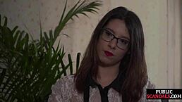 Busty slut in lingerie and heels submits publicly to voyeurs with big tits and nipples exposed.