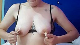 latina in bdsm plays with nipples and wet pussy.