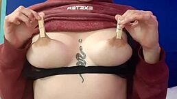 latina in bdsm plays with nipples and wet pussy.