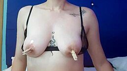 latina in bdsm plays with nipples and wet pussy.