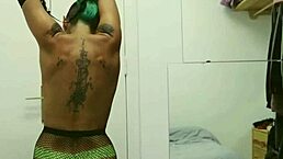 Short Tattooed Girl With Green Hair Does A Hot Striptease