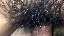 In the pouring rain, two guys engage in passionate anal sex under the open sky